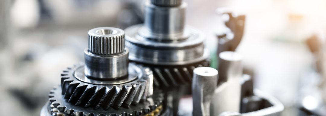 Close-up of automotive gears in a transmission system – what does a transmission do explained