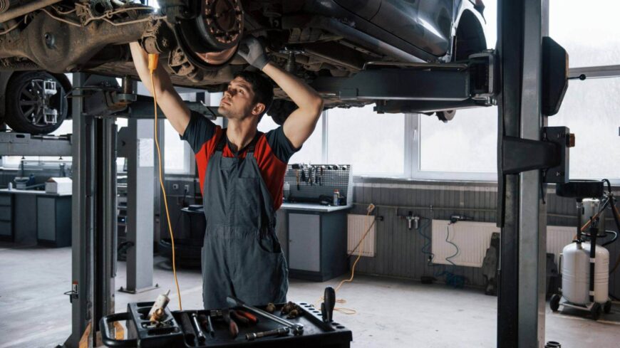 CVT transmission problems Honda Toyota mechanic inspecting transmission under vehicle