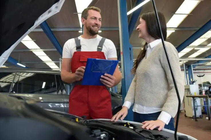 Transmission repair myths mechanic explaining transmission issues to customer