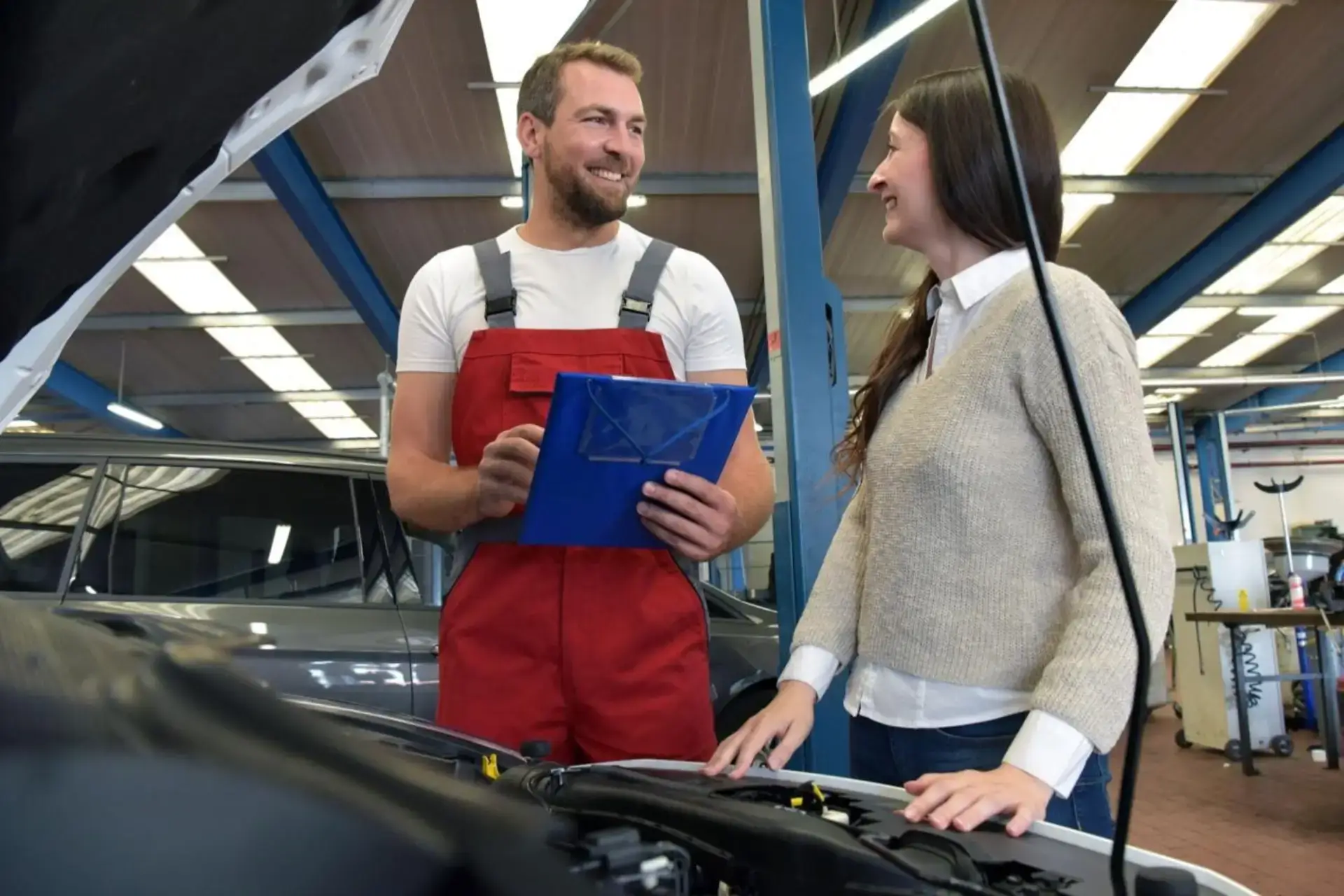 Transmission repair myths mechanic explaining transmission issues to customer